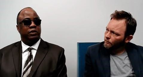 Image of Roderick Thomas and Kyle Johnson sitting down and conversing