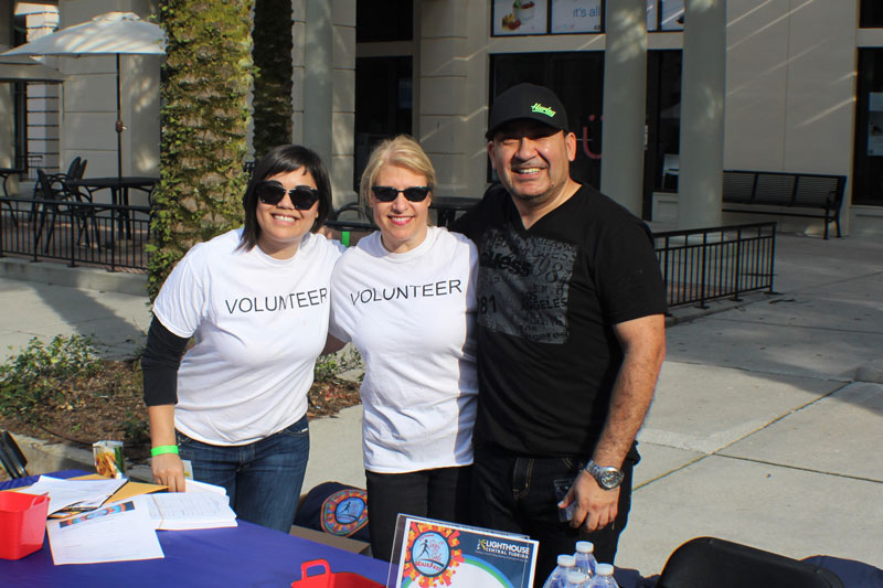 image of 3 Sight and Sole event committee members smiling together